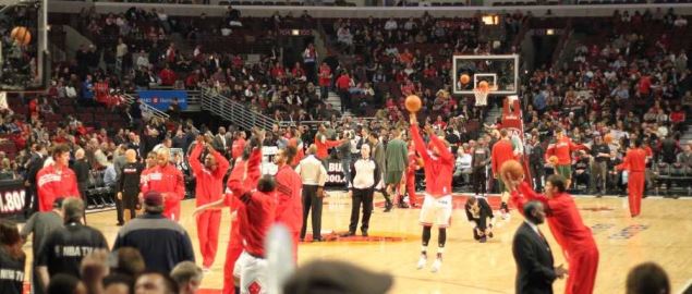 Chicago Bulls players warm up at the United Center during halftime.