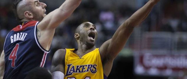 Kobe Bryant of the Los Angeles Lakers shooting against Marcin Gortat of Washington.