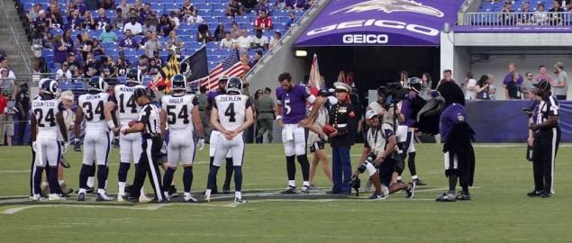 The coin toss at the Los Angeles Rams vs. Baltimore Ravens game.