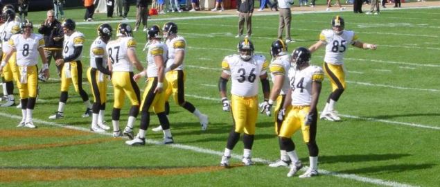 The Pittsburgh Steelers line up for warmup before game.