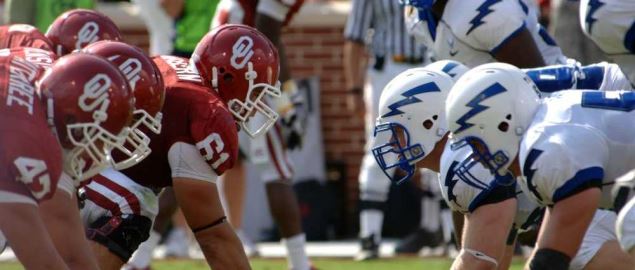 The Falcons' defensive line squares off against the Oklahoma Sooners.