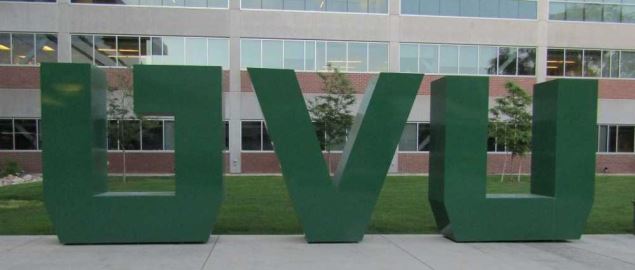 The letters 'UVU' on the campus of Utah Valley University.